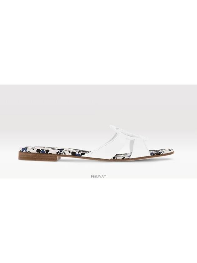 1ACZT5 NEW LV Isola Flat Mule Sandals